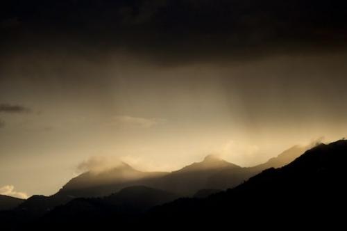 Peak;Cloud;Clouds;Pinnacle;Sunbeam;Weather;Sunshine;Mountains;Sunlight;Sun;Mountainous;Cloudy;Tan;Brown;Grand Tetons;Gold;Cloud Formation;Mountainside;Sky;Mountain;Mountain Top;Sunny;Sunrays;Wyoming;Yellow;Sunlit;Storm;Summit;Bluff;Gray