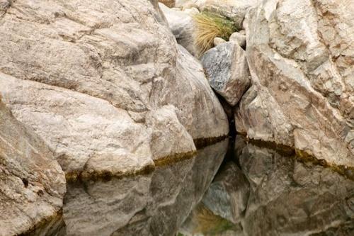 River Bed;Rock Formations;Shapes;Stones;Striation;Brook;Geology;Patterns;Stream;Tan;Textures;Water;Arizona;Rock;Rocks;Stone;Rivers;waterway;Creek;Boulder;Geological;Abstract;Reflections;Abstractions;Sabino Canyon;River;Brown;Reflection;Riverbed