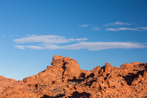 Blue;Bluff;Boulder;Boulders;Calm;Cloud;Cloud Formation;Concepts;Habitat;Healing;Health care;Healthcare;Mountain;Mountainous;Nature;Nevada;Oneness;Pastoral;Rock;Rock formations;Rocks;Rocky;Sunlight;Sunshine;United States;Valley of Fire State Park;cliff;desert;landscape;oneness;orange;peaceful;red;restful;serene;sky;soothing;sunlit;tranquil;zen