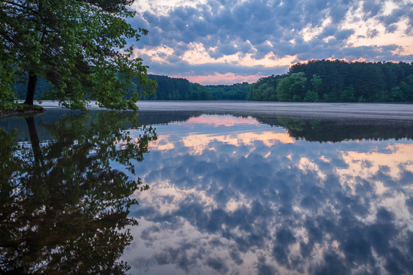 Blue;Bluff;Branches;Calm;Cloud;Cloud Formation;Clouds;Cloudy;Healing;Health care;Healthcare;Hill;Mirror;Mountain;Mountain Side;Mountain Top;Mountainous;Natchez Trace State Park;Nature;Pastoral;Ripple;State Park;Summit;Sunlight;Sunshine;Tennessee;Tree;United States;Water;Waterscape;Weather;dawn;daybreak;green;hillside;lake;landscape;leaves;morn;morning;oneness;peaceful;plants;reflection;reflections;restful;serene;soothing;sunlit;sunrise;sunup;tranquil;tree limbs;trees;trunk;zen
