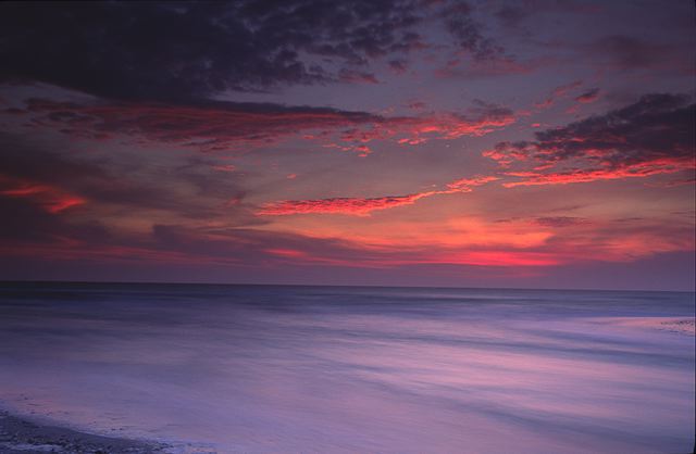 Ocean;Beach;Waves;Shore;Shoreline;Sand;Wet;Water;Sandy;Sea;Pool of Water;Reflections;Oneness;Sunset;Dusk;Twilight;evening;Nightfall;Sundown