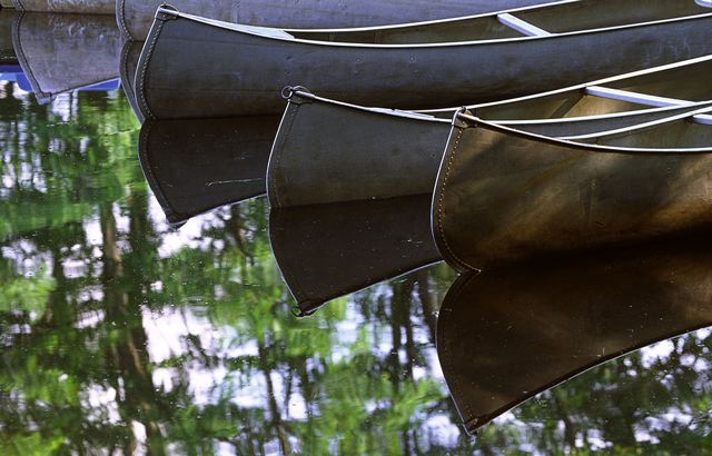 Pool of Water;Reflections;Water;Oneness;Abstract;Abstractions;Patterns;Shapes;Textures;Boats;Canoe