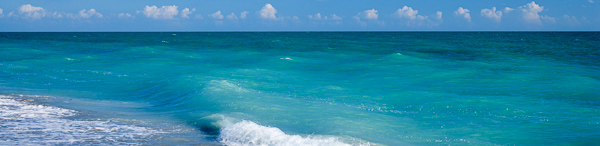 Aqua;Beach;Beaches;Blue;Cloud;Clouds;Florida;Healing;Health care;Healthcare;Ocean;Panoramic;Peaceful;Sand;Sandy;Sanibel Captiva Island;Sea;Seascape;Shore;Shoreline;Sky;Waves;Weather;White;calm;restful;serene;soothing;tranquil