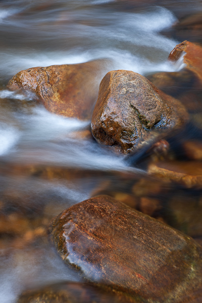 Boulder;Boulders;Brook;Brown;Calm;Cascade;Cascading;Chute;Creek;Falls;Flow;Healing;Health care;Healthcare;Minimalism;Nature;Pastoral;Pouring;River;River Bed;Riverbed;Rivers;Rivulet;Rock;Rock formations;Rocks;Rocky;Spilling;Stone;Stones;Stream;Streaming;Streamlet;Tan;United States;Vermont;Vertical;Water;Waterfalls;Waterscape;flowing;landscape;oneness;orange;peaceful;rapids;restful;serene;soothing;tranquil;waterfall;waterway;zen