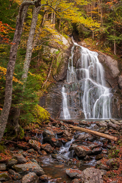 Autumn;Bluff;Boulder;Boulders;Branches;Brown;Calm;Cascade;Cascading;Chute;Cool;Fall;Falling;Falls;Flow;Forest;Forested;Gold;Healing;Health care;Healthcare;Moss Glen Falls;Nature;New England;Pastoral;Pouring;Rock;Rock Face;Rock formations;Rocks;Rocky;Seasons;Spilling;Stone;Stones;Stream;Streaming;Tan;Timber;Timberland;Tree;United States;Vermont;Water;Waterfalls;Waterscape;Woodland;Woods;Yellow;cliff;green;landscape;leaves;limbs;oneness;peaceful;plants;restful;serene;soothing;tranquil;tree limbs;trees;trunk;waterfall;wet;zen