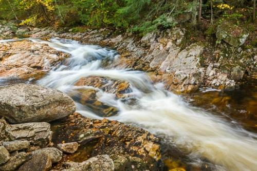 Boulder;Boulders;Brown;Cascade;Chute;Creek;Falls;Flow;Forest;Green;New England;Orange;Pouring;Rapids;River;Rock;Rock Formations;Rocks;Rocky;Stone;Stones;Stream;Stream Bank;Streaming;Tan;Trees;Vermont;Water;Waterfall;Waterfalls;Woods;Yellow;flowing;river bank