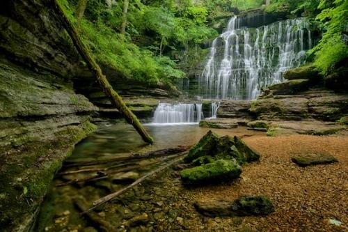 Stone;Cascading;Machine Falls;Rock Formations;Short Springs State Natural Area;Stones;Waterfalls;cliff;Striations;Green;Rock;Falls;Pouring;Cascade;Brown;Tan;Waterfall;Boulders;Boulder;Chute;Striated;Rock Face