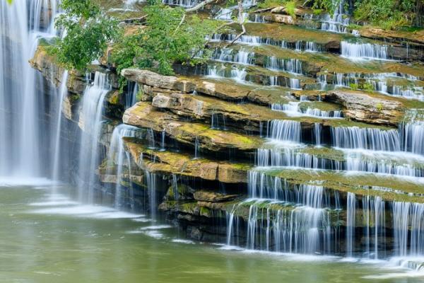 Boulder;Boulders;Branches;Brown;Calm;Cascade;Cascading;Chute;Concepts;Cool Colors;Cool Palette;Cool Tones;Falling;Falls;Flow;Green;Greens;Healing;Health care;Healthcare;Moss;Nature;Oneness;Pastoral;Pouring;River;Rock;Rock Island;Rock Island State Park;Rock formations;Rocks;Spilling;State Park;Stone;Stones;Streaming;Tan;Tennessee;United States;Water;Waterfalls;Waterscape;color;flowing;landscape;peaceful;rapids;restful;serene;soothing;tranquil;tree limbs;trees;waterfall;wet;zen