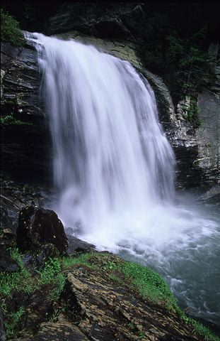 Cliff;Rock Face;Sheer;Steep;Waterfall;Stream;Water;Flowing;Pouring;Cool;Wet;Flow;Cascade;Cascading;Spray;Cataract;Falls;Chute;Falling;Spilling